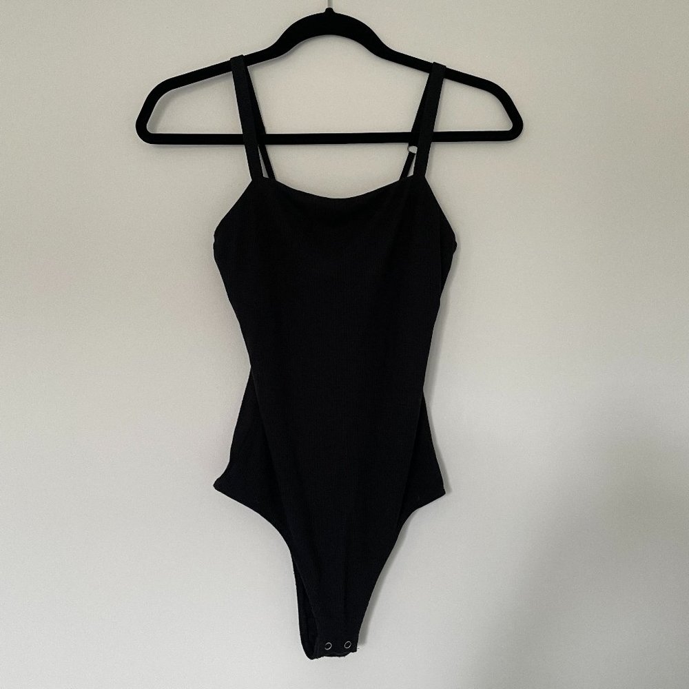 Ribbed Black Bodysuit with Snap Button Enclosure